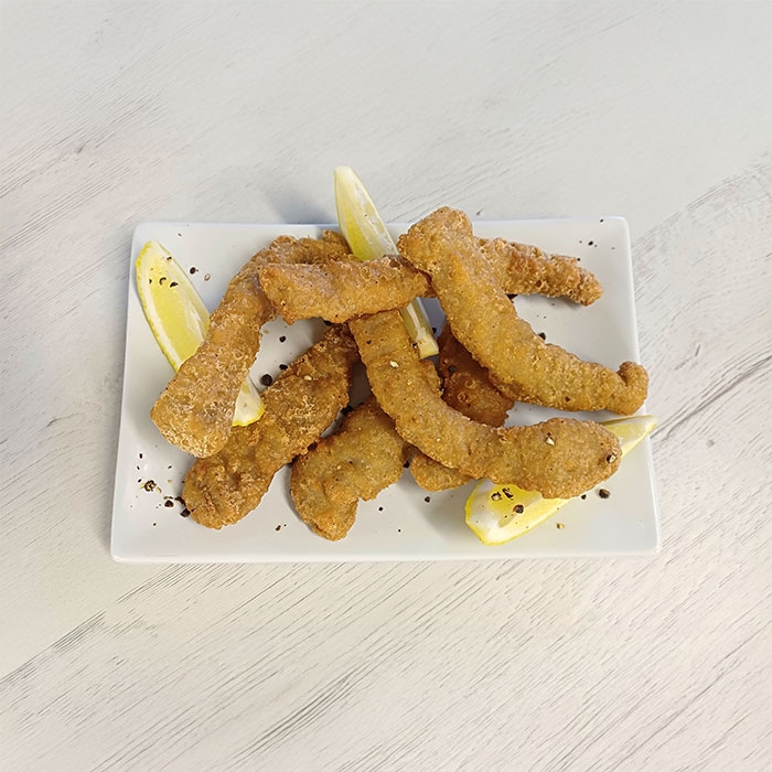 Tiras de pollo Lemon Pepper con  limón y pimienta negra